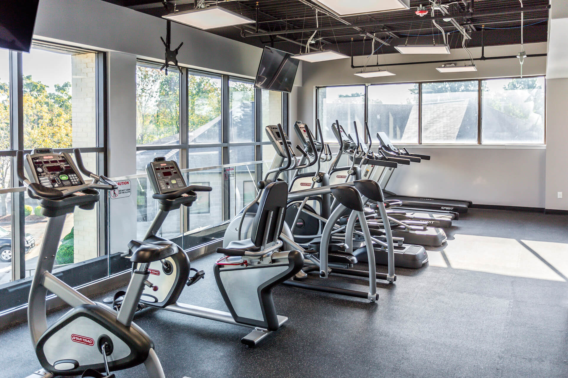 gym with amenities at the stretch apartments